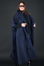Dark blue sleeveless wool-blend cape with single-button closure and side pockets - cashmere-like feel, Carly | EUG Fashion #dark-blue
