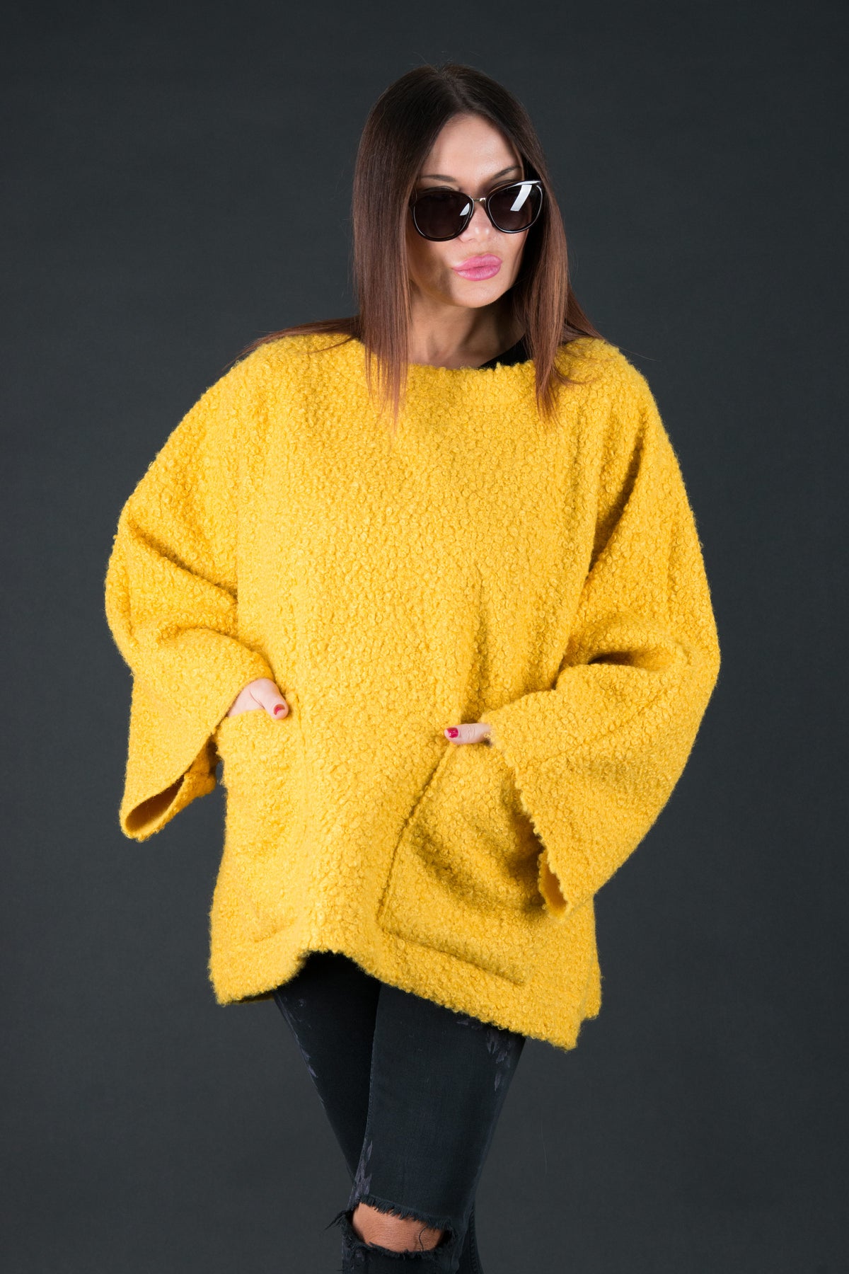 Mustard bouclé poncho with merino wool-like feel and two front pockets - wear as a top or outer layer, Magdalena | EUG Fashion #mustard
