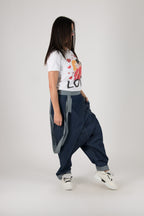 Dark blue jeans drop-crotch pants Lesila — side view, studio

