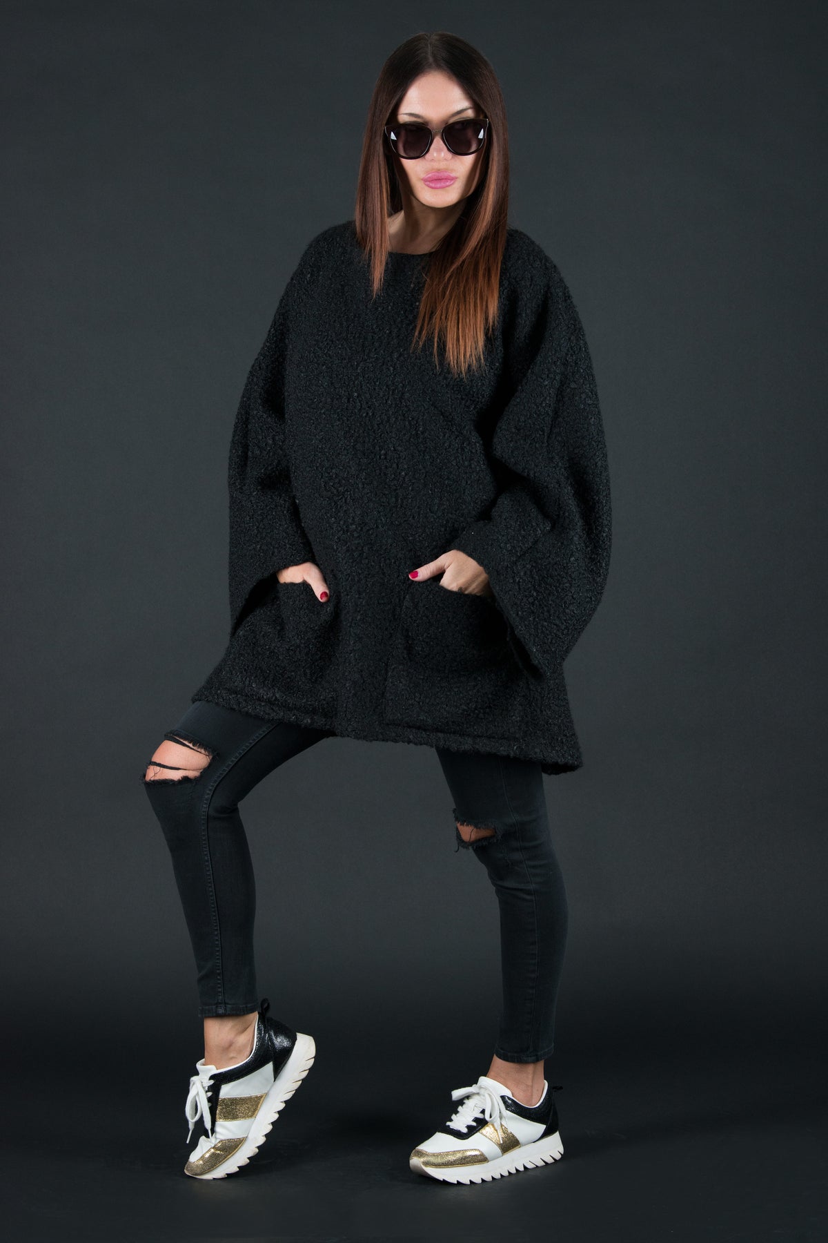 Black bouclé poncho with merino wool-like feel and two front pockets - wear as a top or outer layer, Magdalena | EUG Fashion #black
