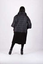 Black quilted poncho with wide sleeves and high collar - warm cotton wadding, worn over clothes, Mari | EUG Fashion #black
