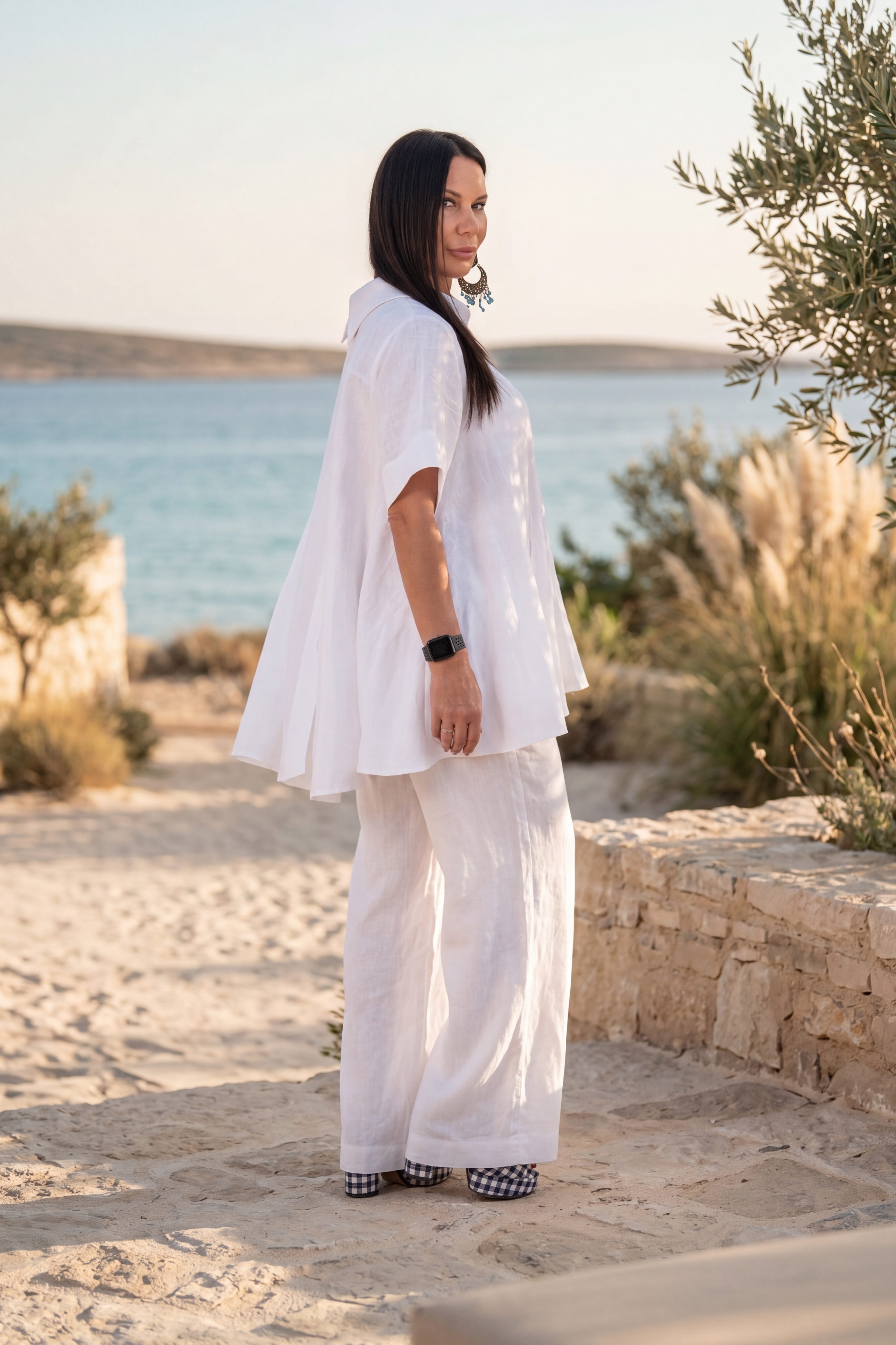 Woman in a white linen  outfit #white