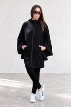 Black hooded poncho sweatshirt - batwing sleeves, snap-fastening pockets and Wild at Heart back print, Melody | EUG Fashion #black