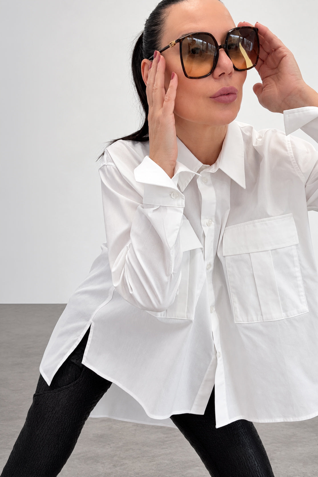 White asymmetric cotton shirt - large front pockets, high-low hem, long sleeves with buttoned cuffs, Anel | EUG Fashion #white