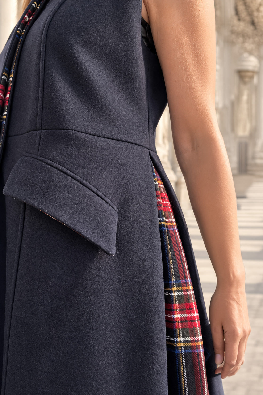 Dark Blue sleeveless wool coat - flared silhouette, red tartan side pleats and angled pocket flaps, Evelin | EUG Fashion #dark-blue⠋