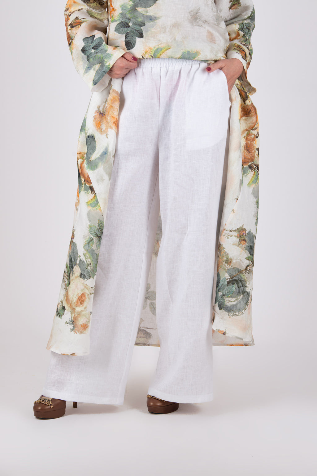 Person wearing a white linen pants Jesika by EUG fashion