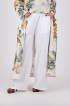 Person wearing a white linen pants Jesika by EUG fashion