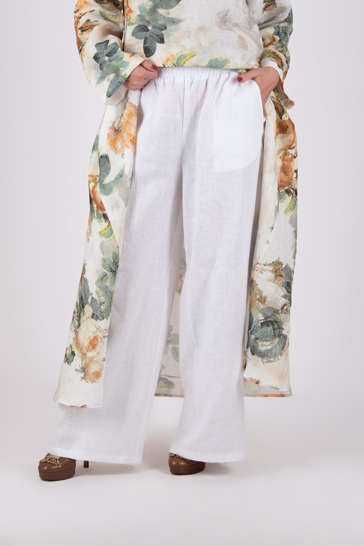 Person wearing a white linen pants Jesika by EUG fashion