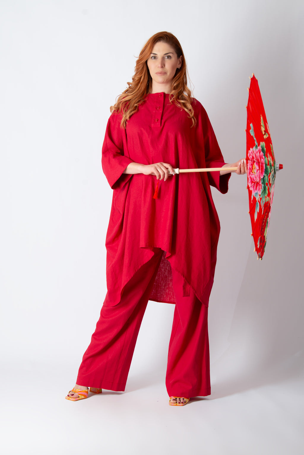 Woman in a red linen outfit 