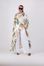 Woman wearing a white linen loose pants - EUG fashion