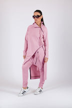 Woman wearing a pink sweatshirt
