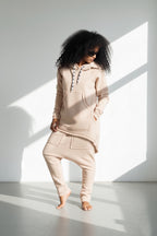 Beige fluffy hooded tracksuit with asymmetric top and harem trousers - warm winter wadding fabric, Megan | EUG Fashion #beige
