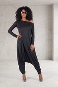 Black jersey harem jumpsuit - boat neckline, fitted sleeves and loose draped silhouette with tapered legs, Marla | EUG Fashion