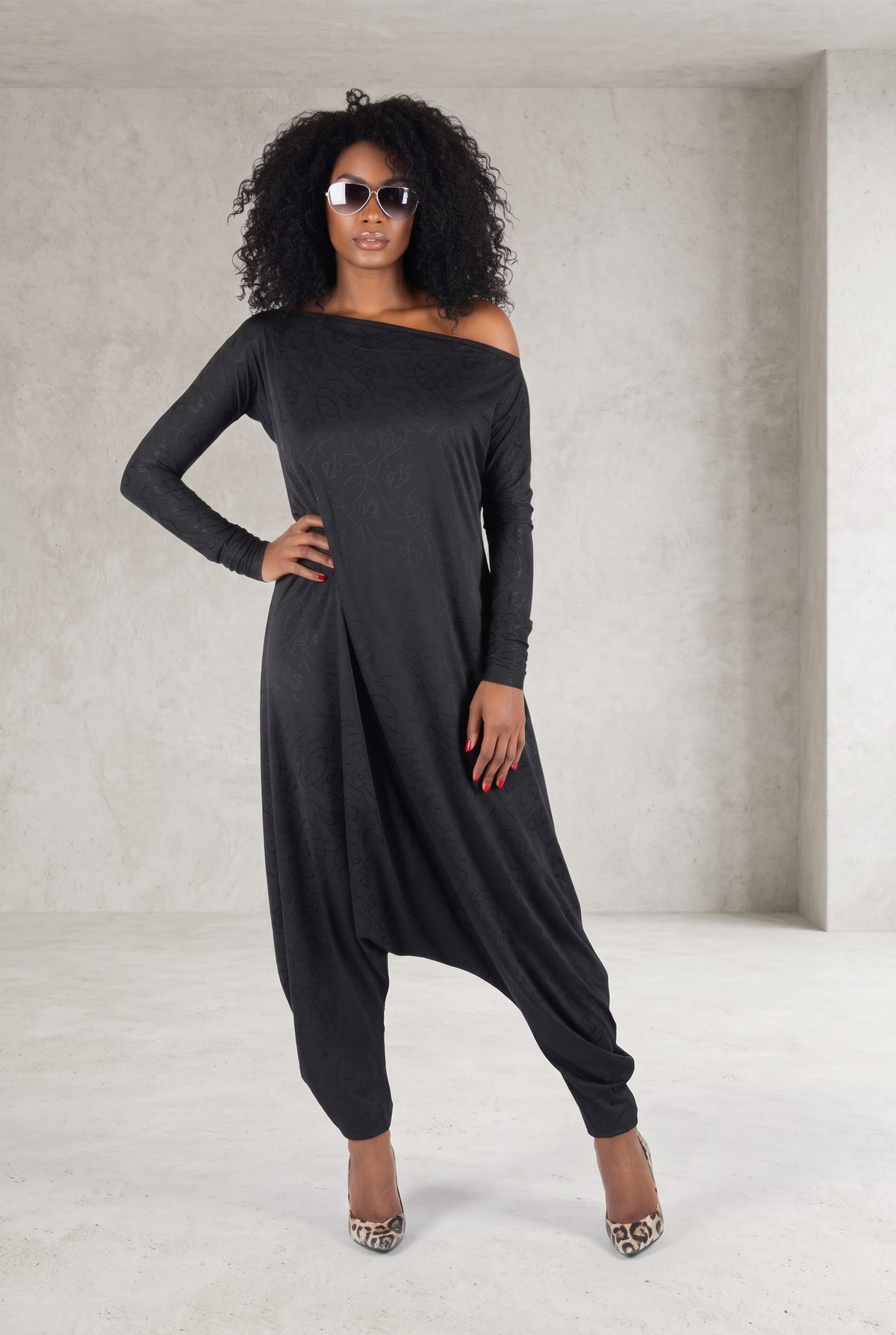 Black jersey harem jumpsuit - boat neckline, fitted sleeves and loose draped silhouette with tapered legs, Marla | EUG Fashion