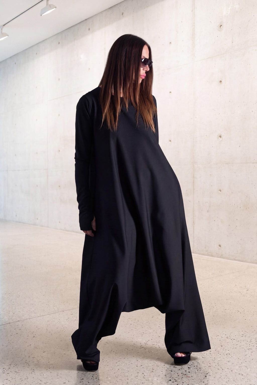 woman in wide long jumpsuit #black