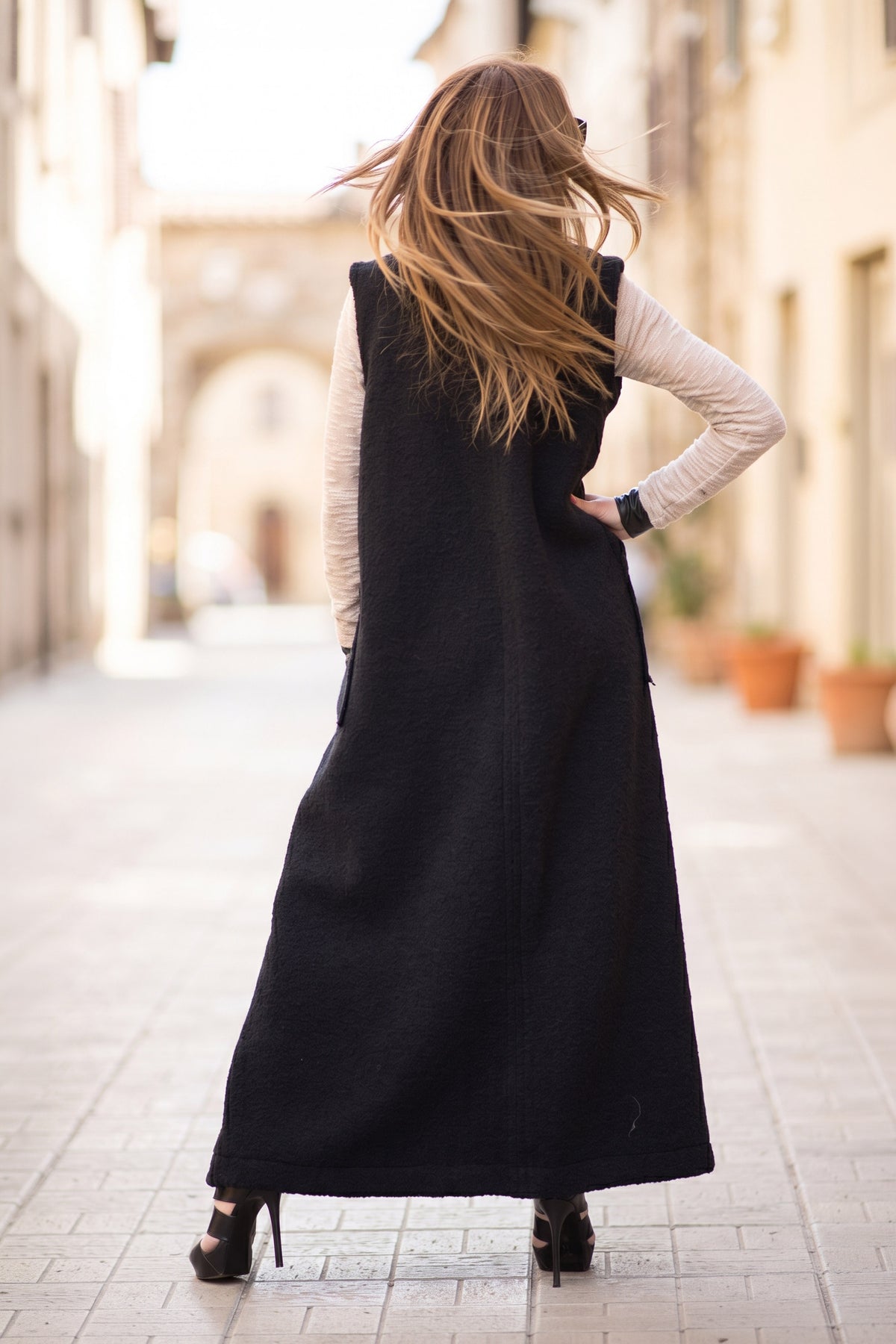 Black long sleeveless wool-feel vest with single-button closure - warm layering piece, Irene | EUG Fashion #black
