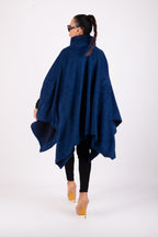 Royal blue soft bouclé knitted poncho with turtleneck and asymmetric arm openings - relaxed silhouette, Eva | EUG Fashion #royal-blue
