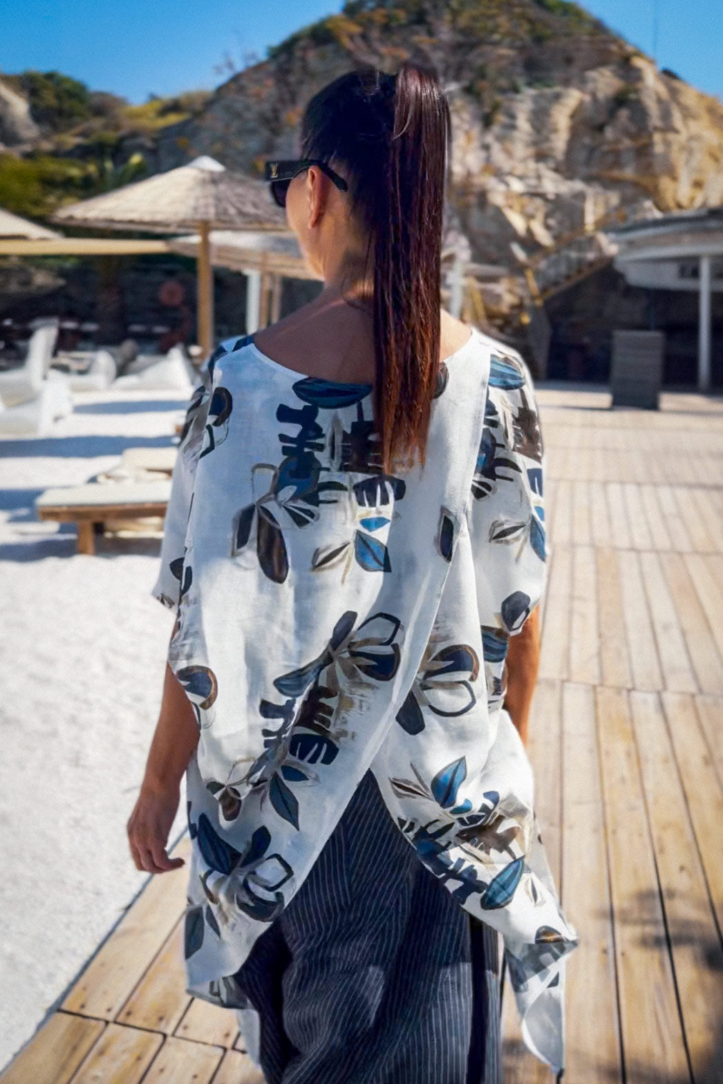 Woman wearing floral linen top by eug fashion