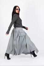 woman light gray skirt 