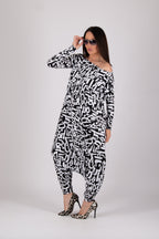 Black white stretch jersey harem jumpsuit - geometric and lettering print, boat neckline and narrow sleeves, Marla | EUG Fashion