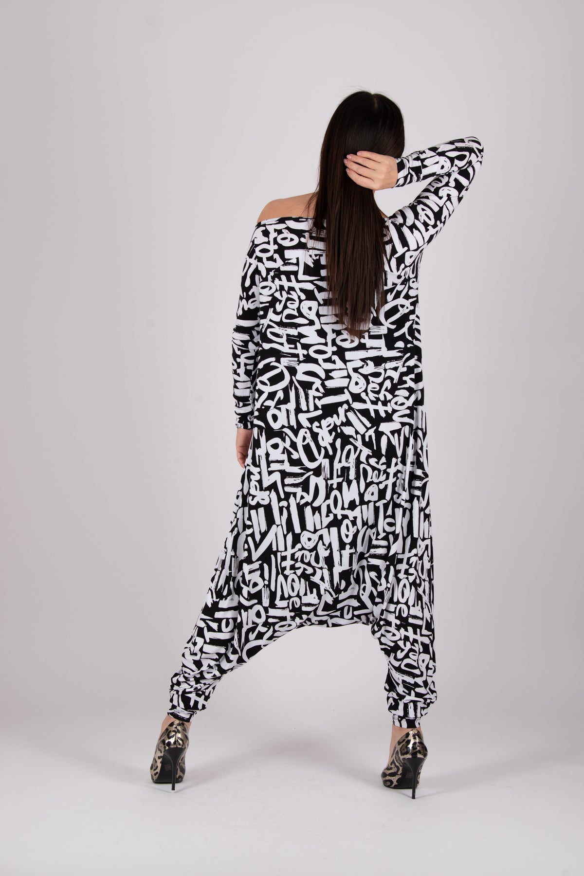 Black white stretch jersey harem jumpsuit - geometric and lettering print, boat neckline and narrow sleeves, Marla | EUG Fashion