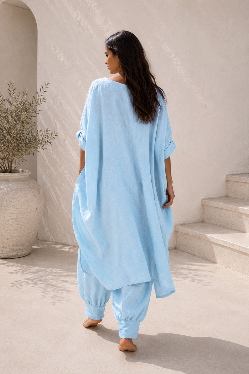 Woman in light blue linen outfit #light-blue