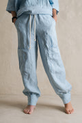 Woman in light blue linen outfit #light-blue
