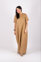 Woman wearing a beige jumpsuit - EUG fashion