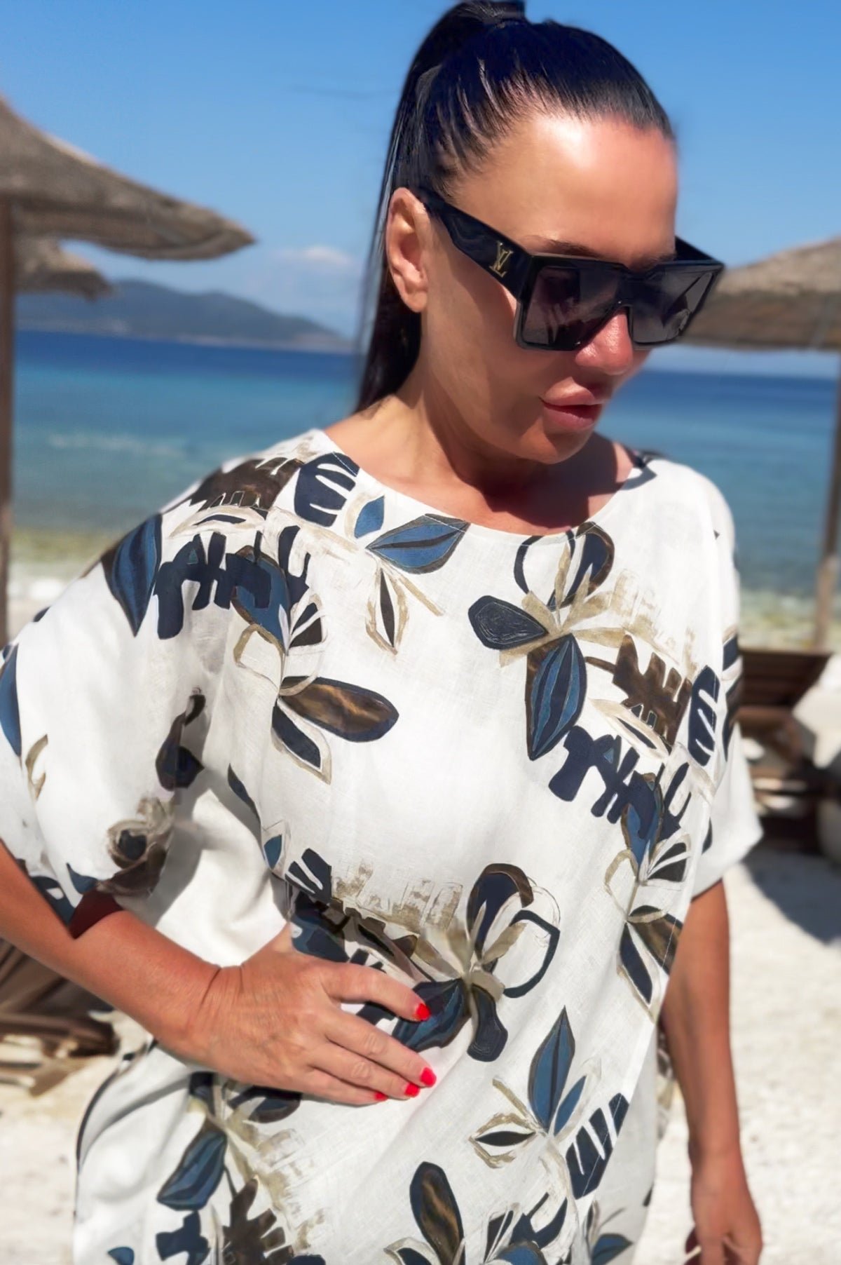 Woman in a floral tunic- eug fashion