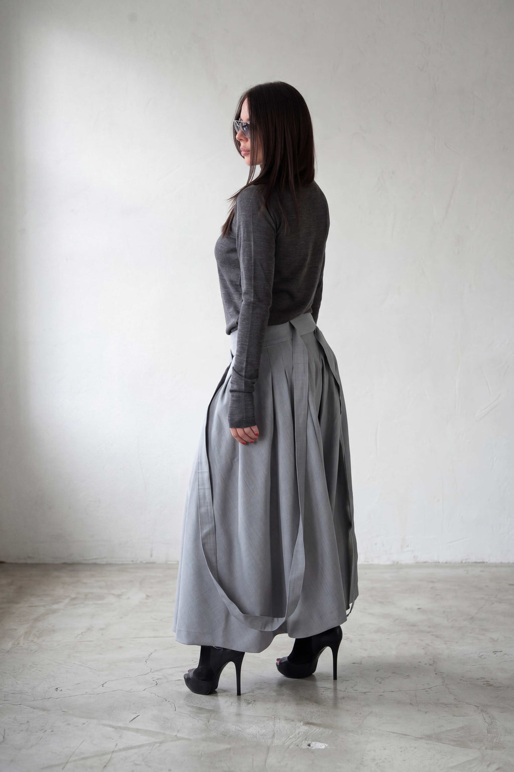 woman light grey skirt