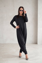 Black jersey harem jumpsuit - boat neckline, fitted sleeves and loose draped silhouette with tapered legs, Marla | EUG Fashion