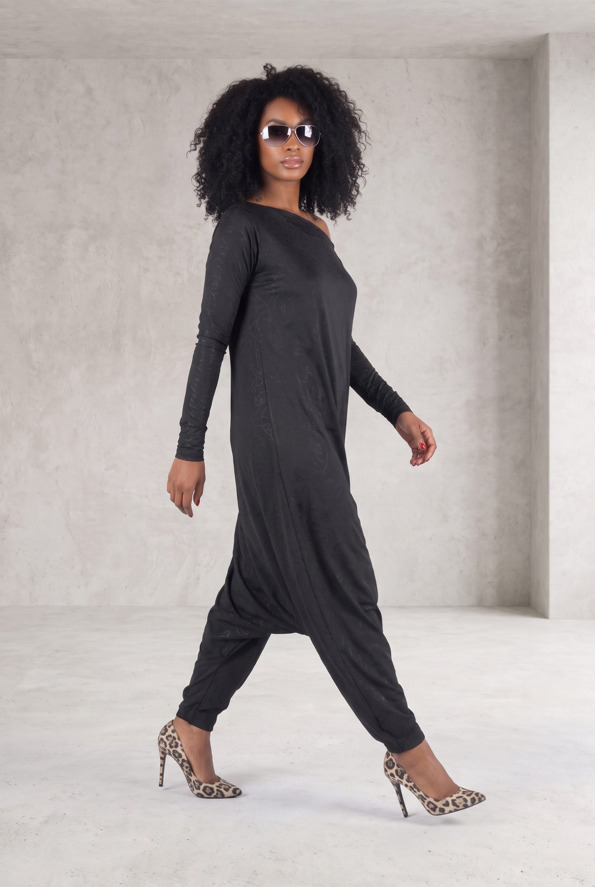 Black jersey harem jumpsuit - boat neckline, fitted sleeves and loose draped silhouette with tapered legs, Marla | EUG Fashion