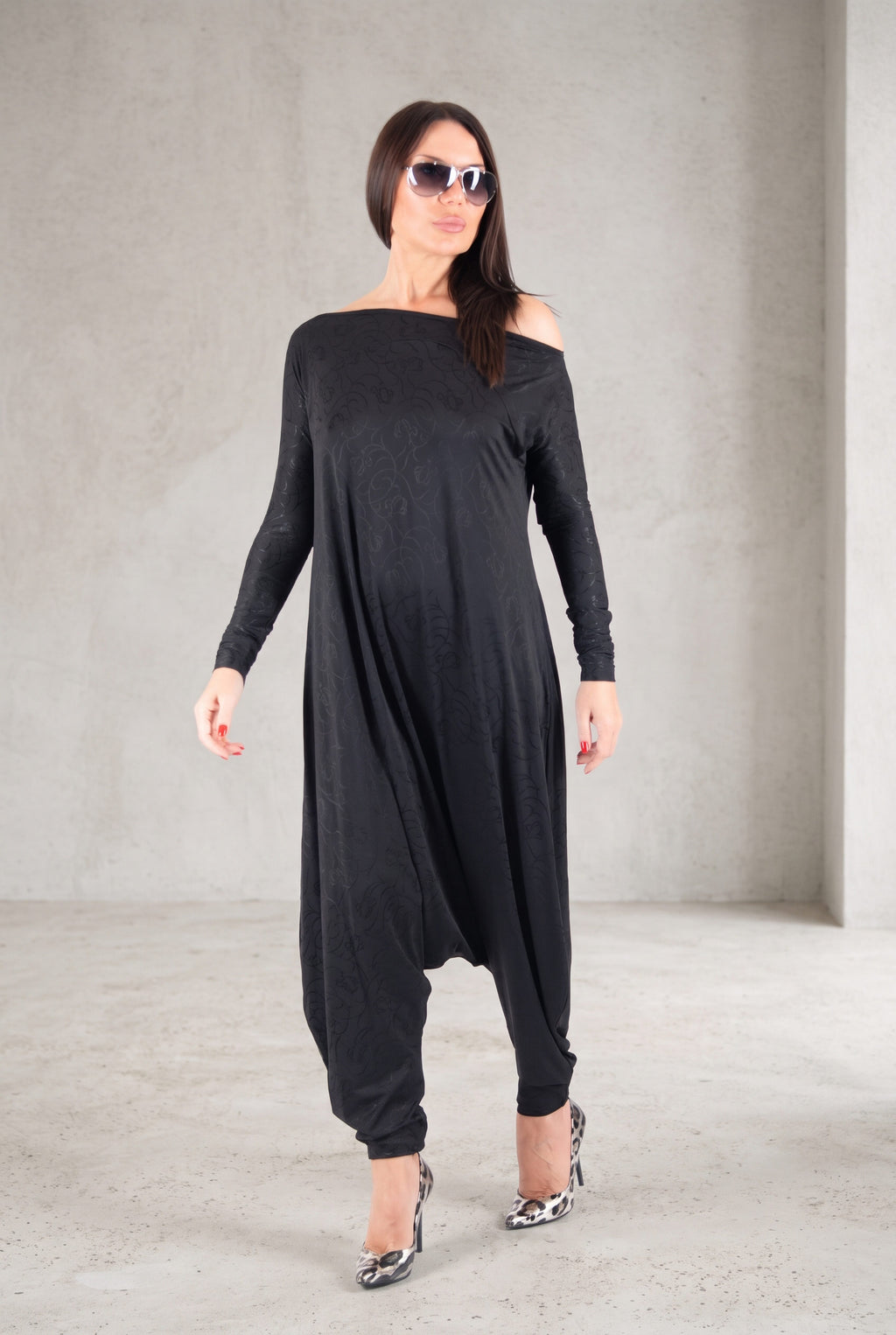 Black jersey harem jumpsuit - boat neckline, fitted sleeves and loose draped silhouette with tapered legs, Marla | EUG Fashion