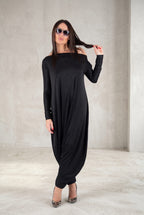 Black jersey harem jumpsuit - boat neckline, fitted sleeves and loose draped silhouette with tapered legs, Marla | EUG Fashion