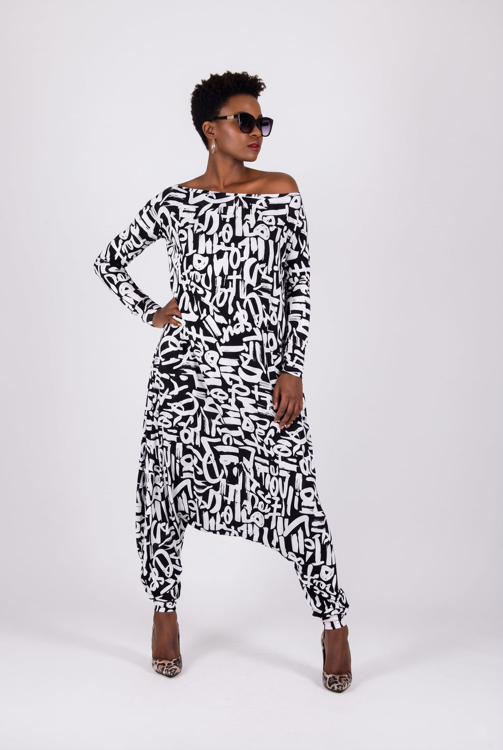 Black white stretch jersey harem jumpsuit - geometric and lettering print, boat neckline and narrow sleeves, Marla | EUG Fashion