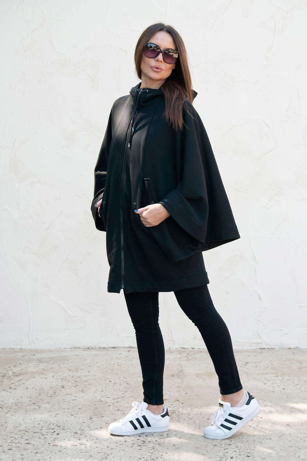 Black hooded poncho sweatshirt - batwing sleeves, snap-fastening pockets and Wild at Heart back print, Melody | EUG Fashion #black