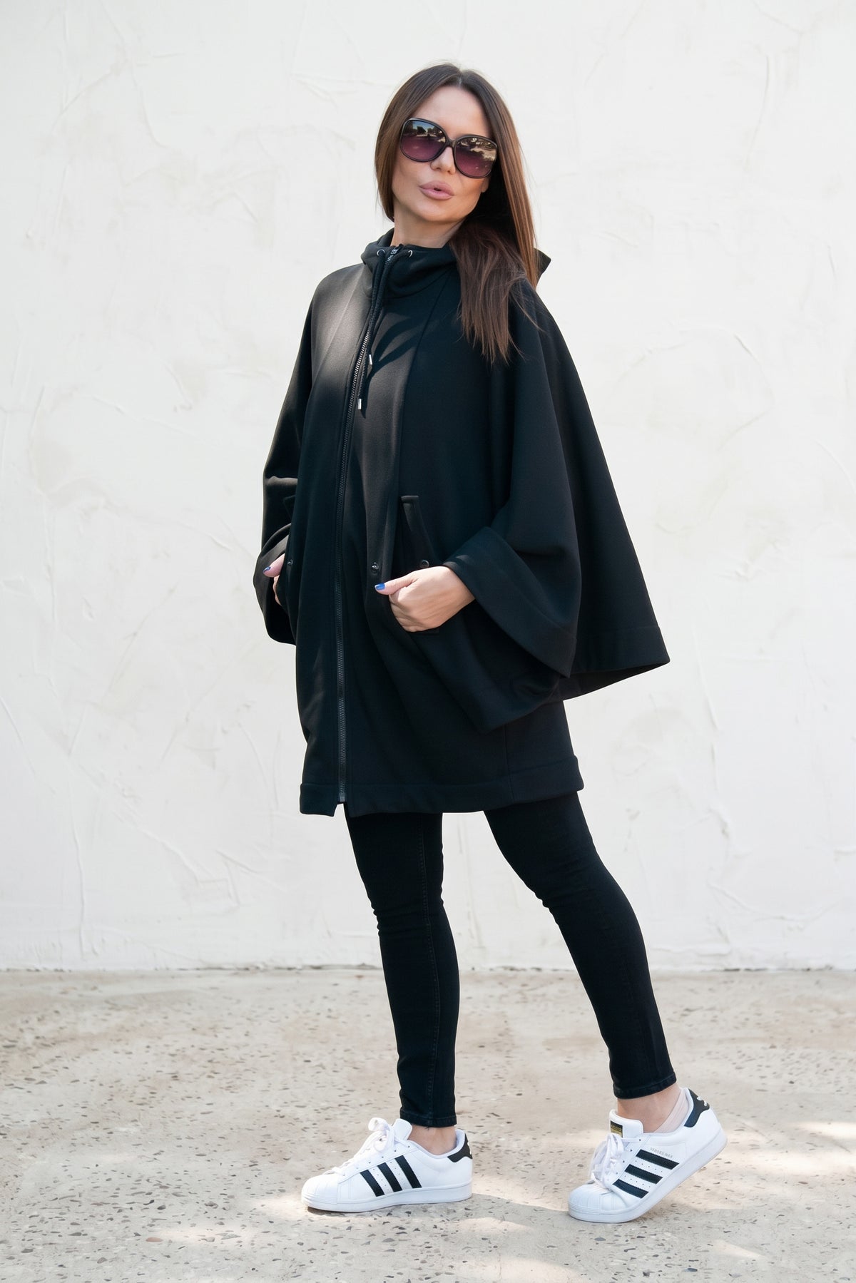 Black hooded poncho sweatshirt - batwing sleeves, snap-fastening pockets and Wild at Heart back print, Melody | EUG Fashion #black