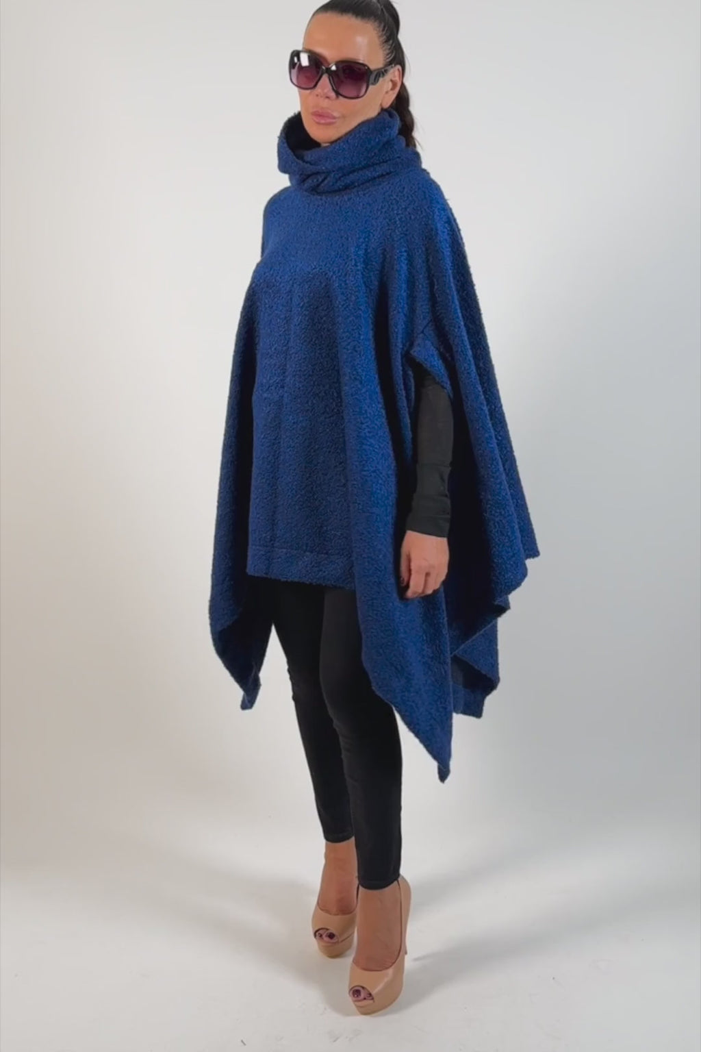 Royal blue soft bouclé knitted poncho with turtleneck and asymmetric arm openings - relaxed silhouette, Eva | EUG Fashion #royal-blue
