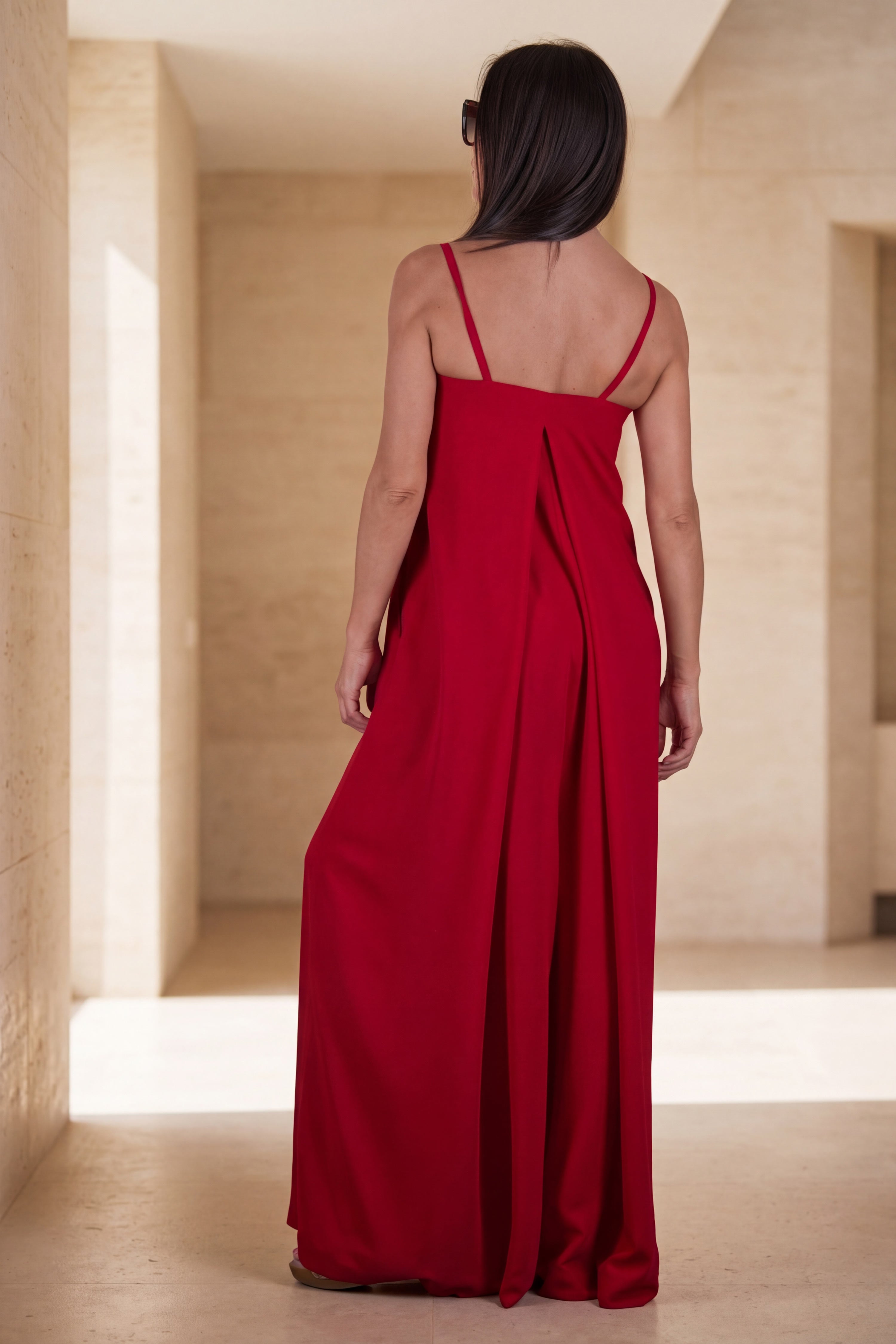 Woman wearing a red jumpsuit  - EUG fashion