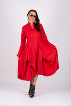 Woman wearing a red dress on a white background