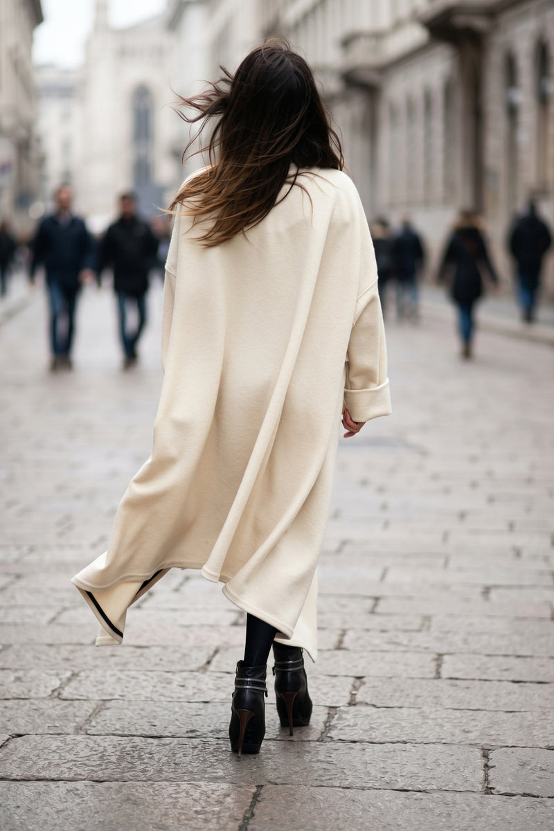 Off-white cashmere-feel cape coat with decorative side zippers and classic collar - asymmetric unlined design, Federica | EUG Fashion #off-white
