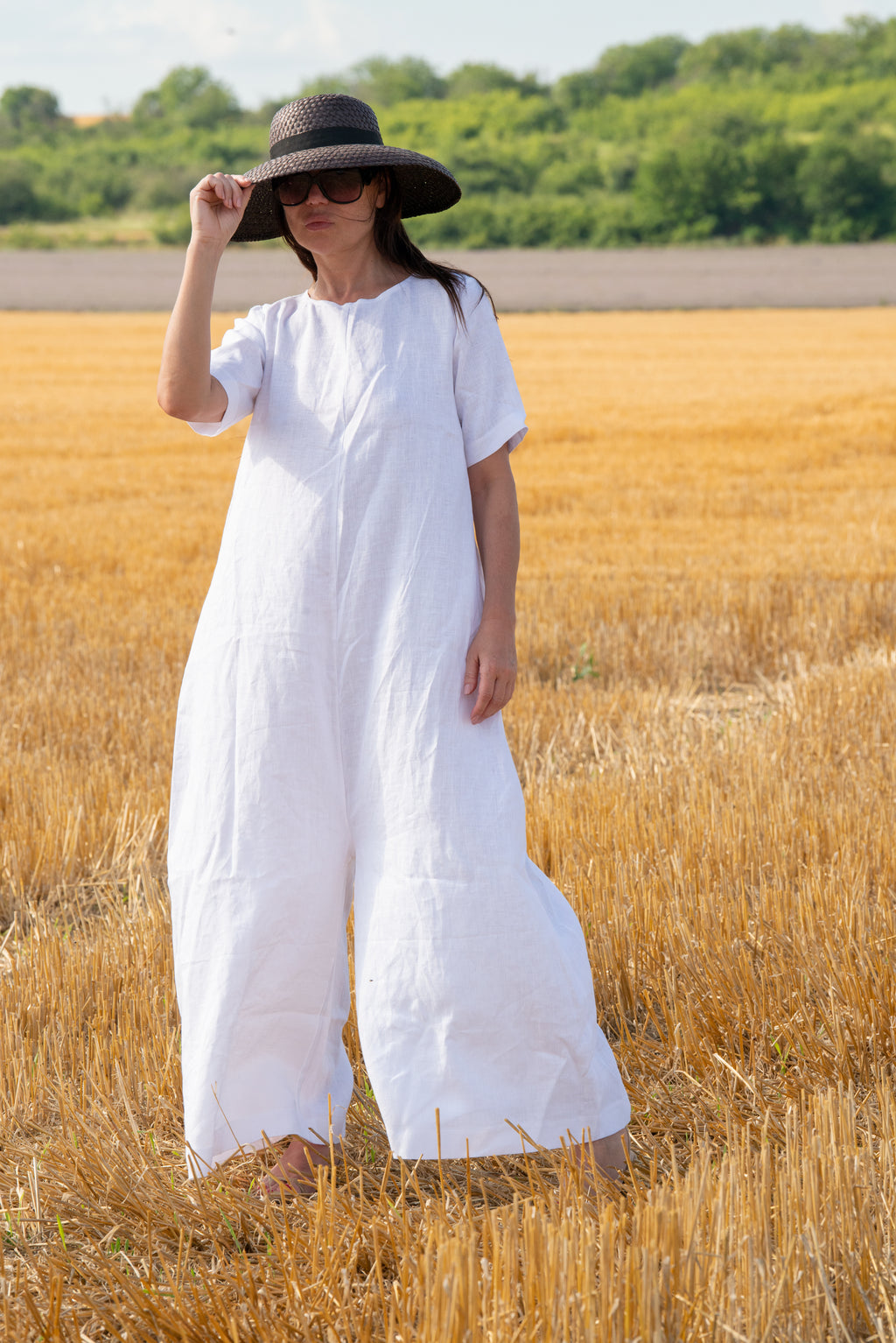 Woman in a white jumpsuit - eug fashion