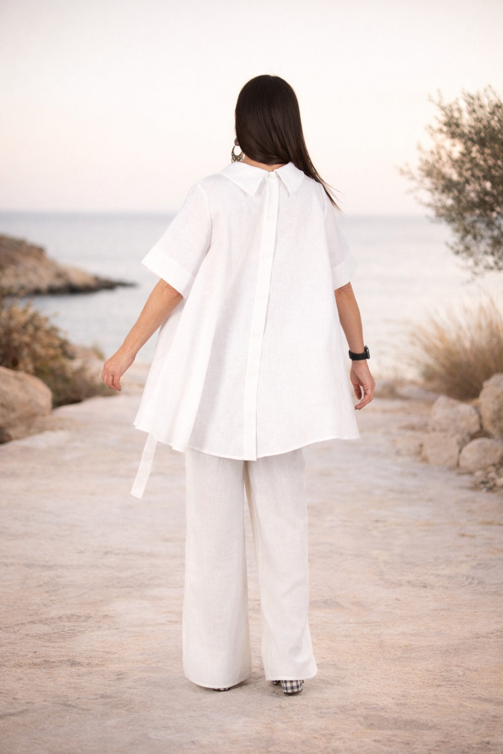 Woman in a white linen  outfit #white
